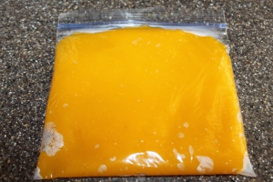 1 cup of pumpkin puree ready to be frozen. 