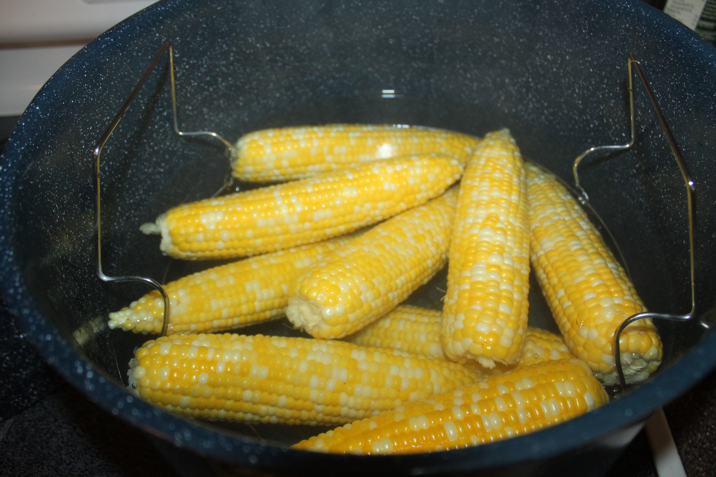 Place husked corn in boiling water for 3 minutes.