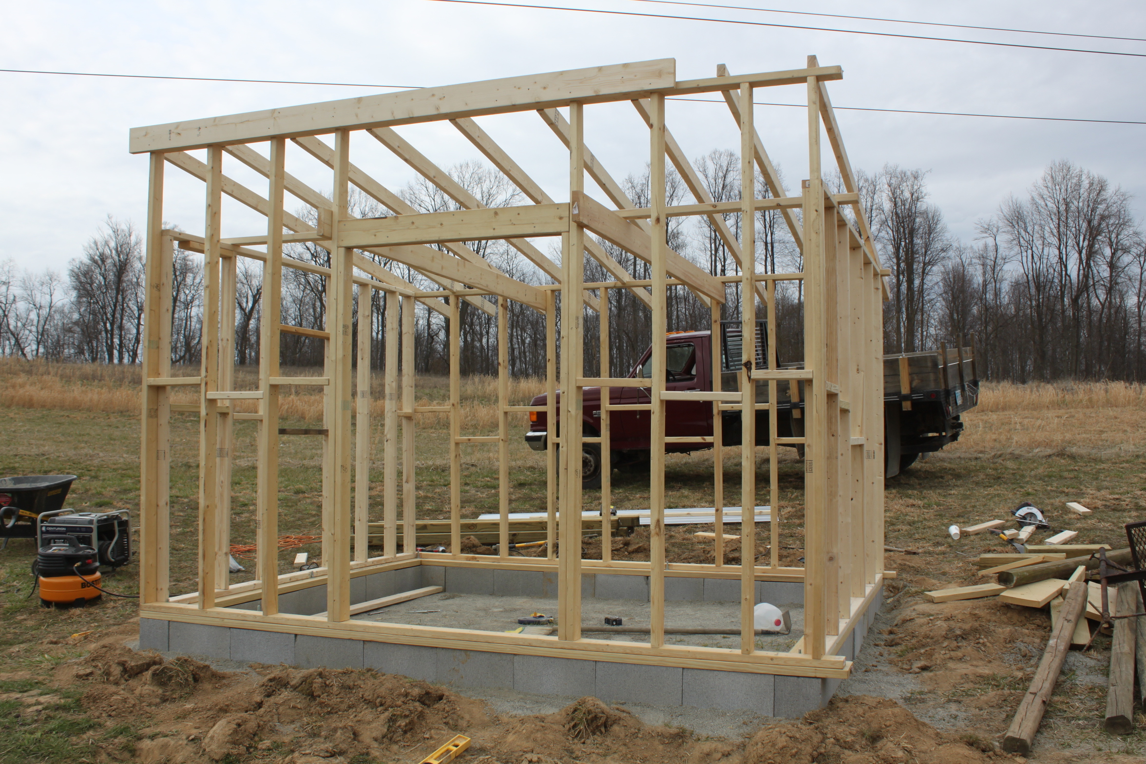The coop was framed in 2 x4's - on top of a concrete block foundation 