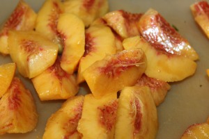 Peaches peeled and pitted, ready to be made into a dessert